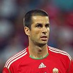 A. Komlosi